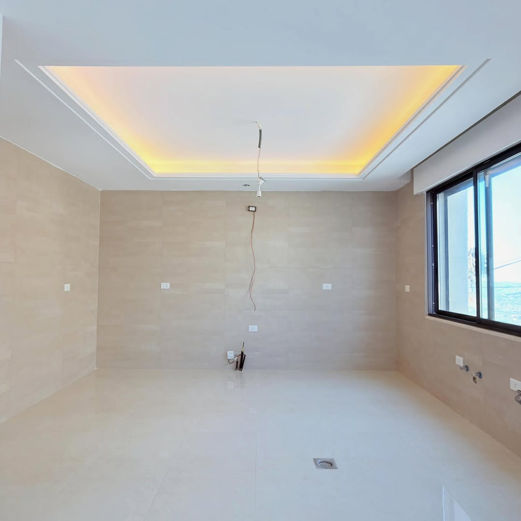 Raised ground-floor apartment with a private garage