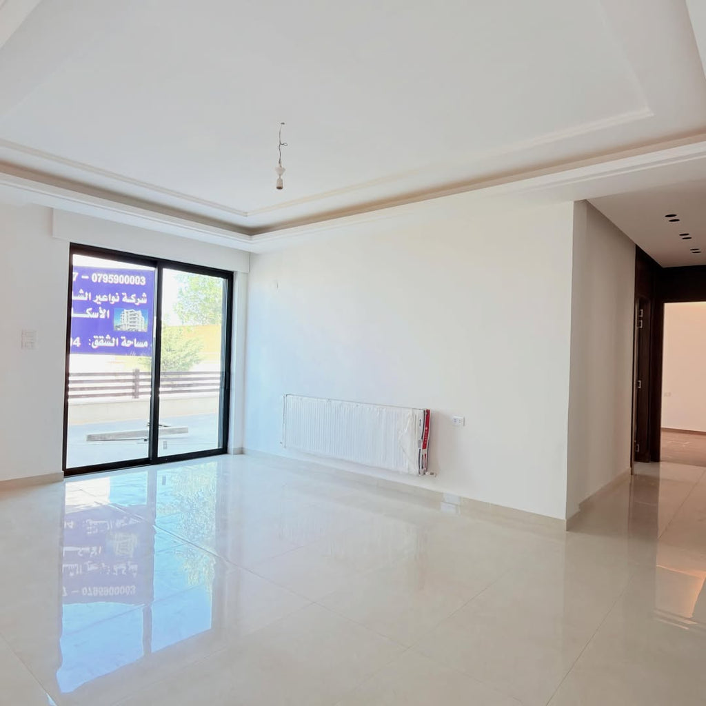 Raised ground-floor apartment with a private garage