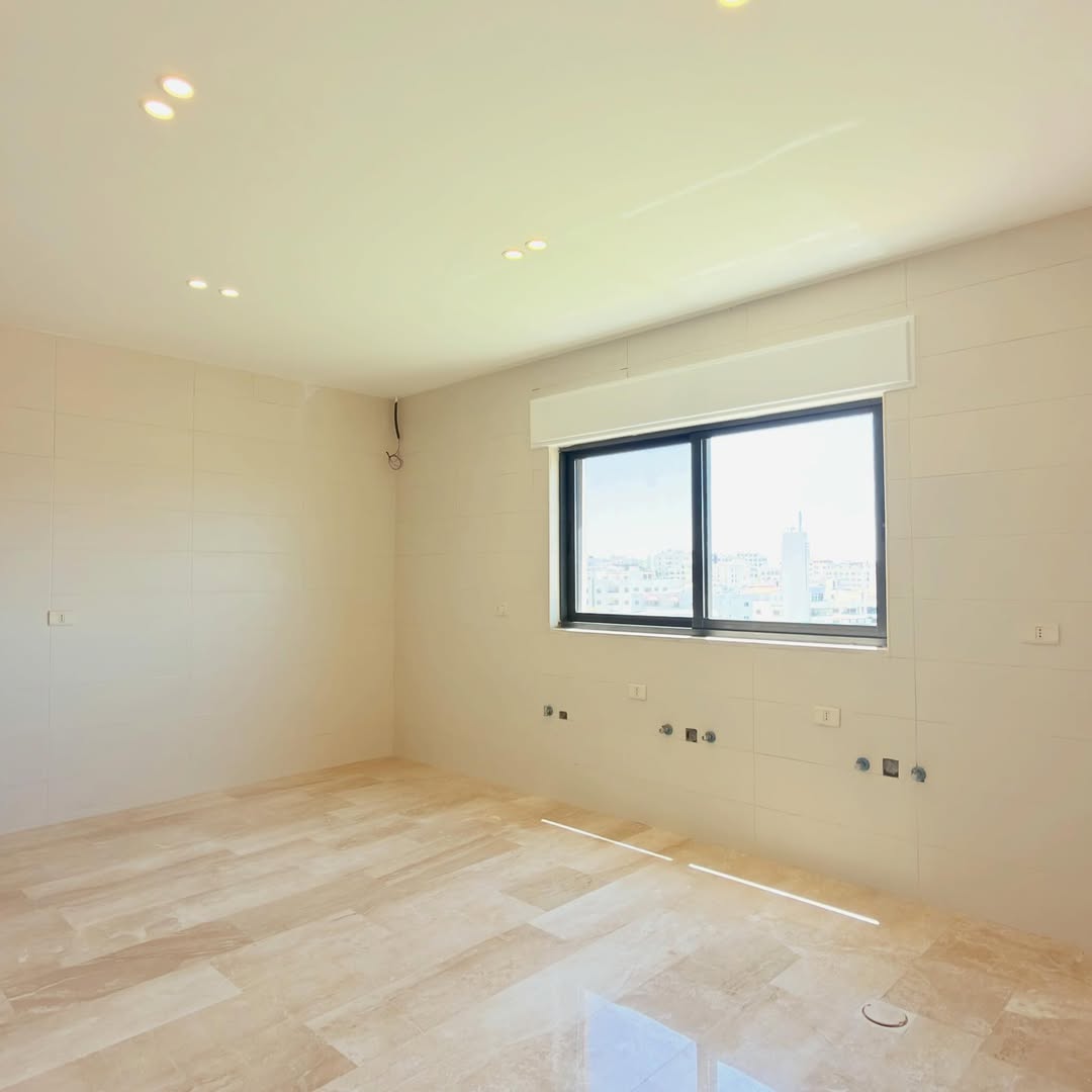 First-floor apartment with a roof, located in Khalda
